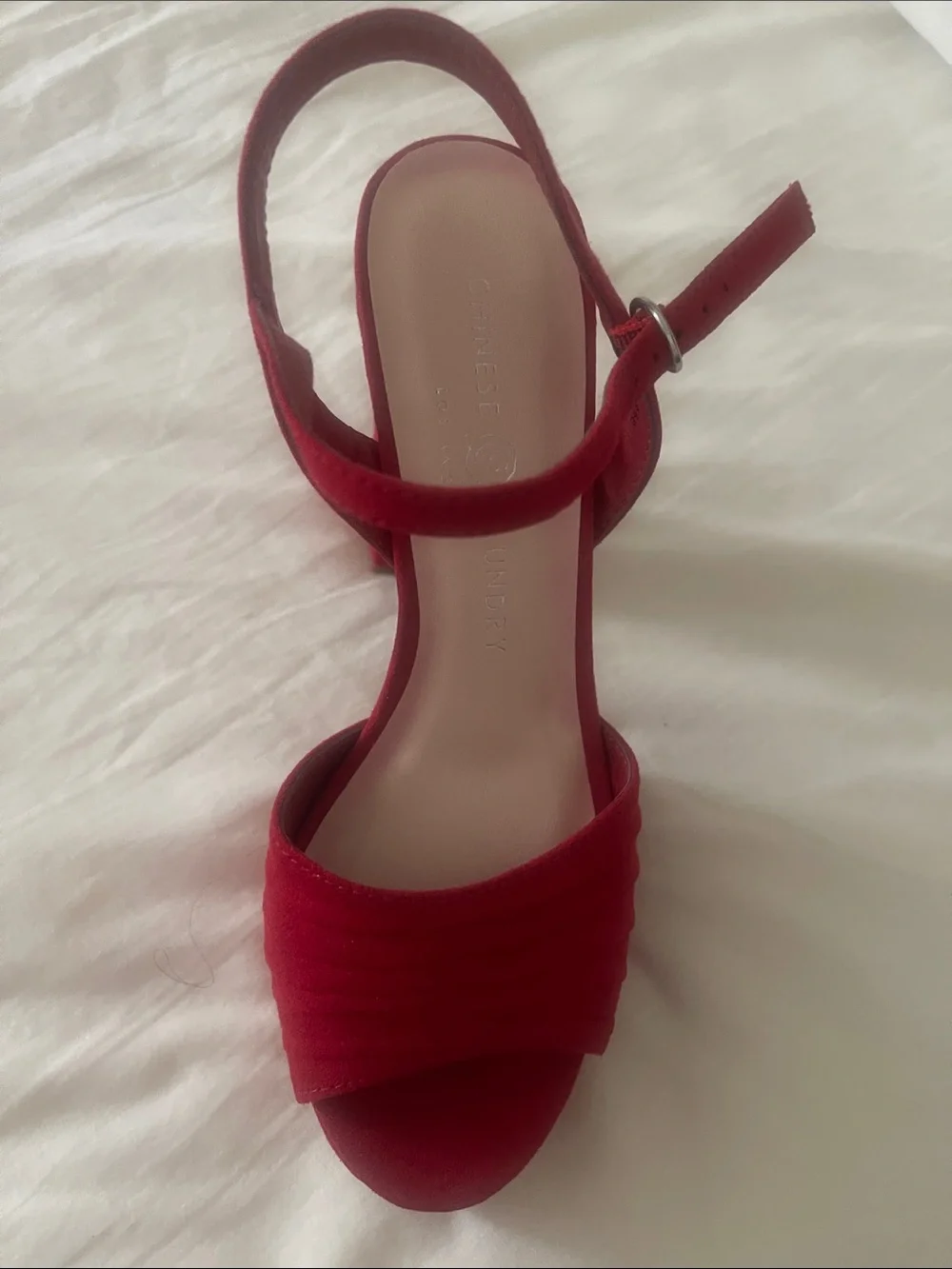 Chinese Laundry striking red